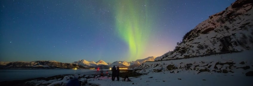 Two people admiring the Northern Lights